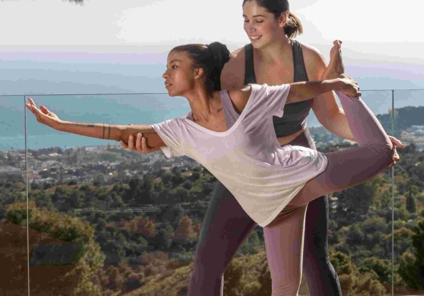 full-shot-woman-trying-yoga-pose (1)