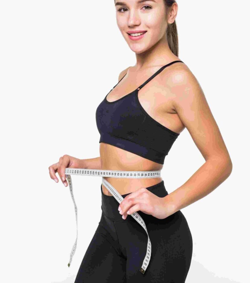 young-fitness-woman-measure-with-tape-her-belly-isolated-white-wall (1)
